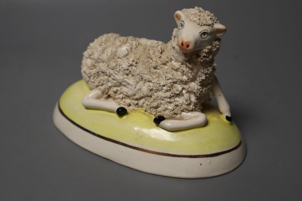 A humorous group of five cats having Five oclock Tea and a pottery sheep group, 9cm